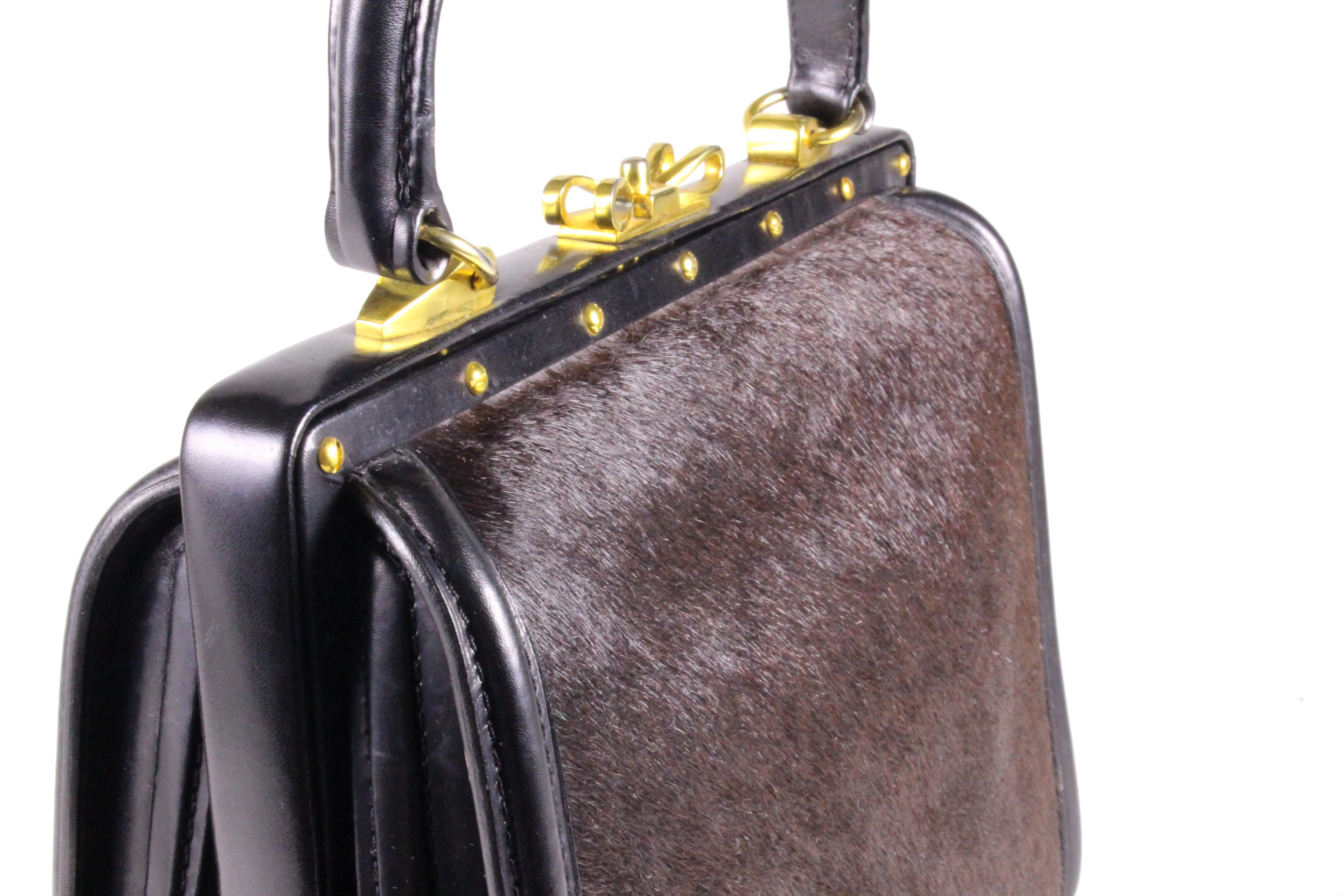 Black leather and brown fur frame handbag