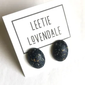 Black Paint Spattered Oval Lucite Stud Earrings