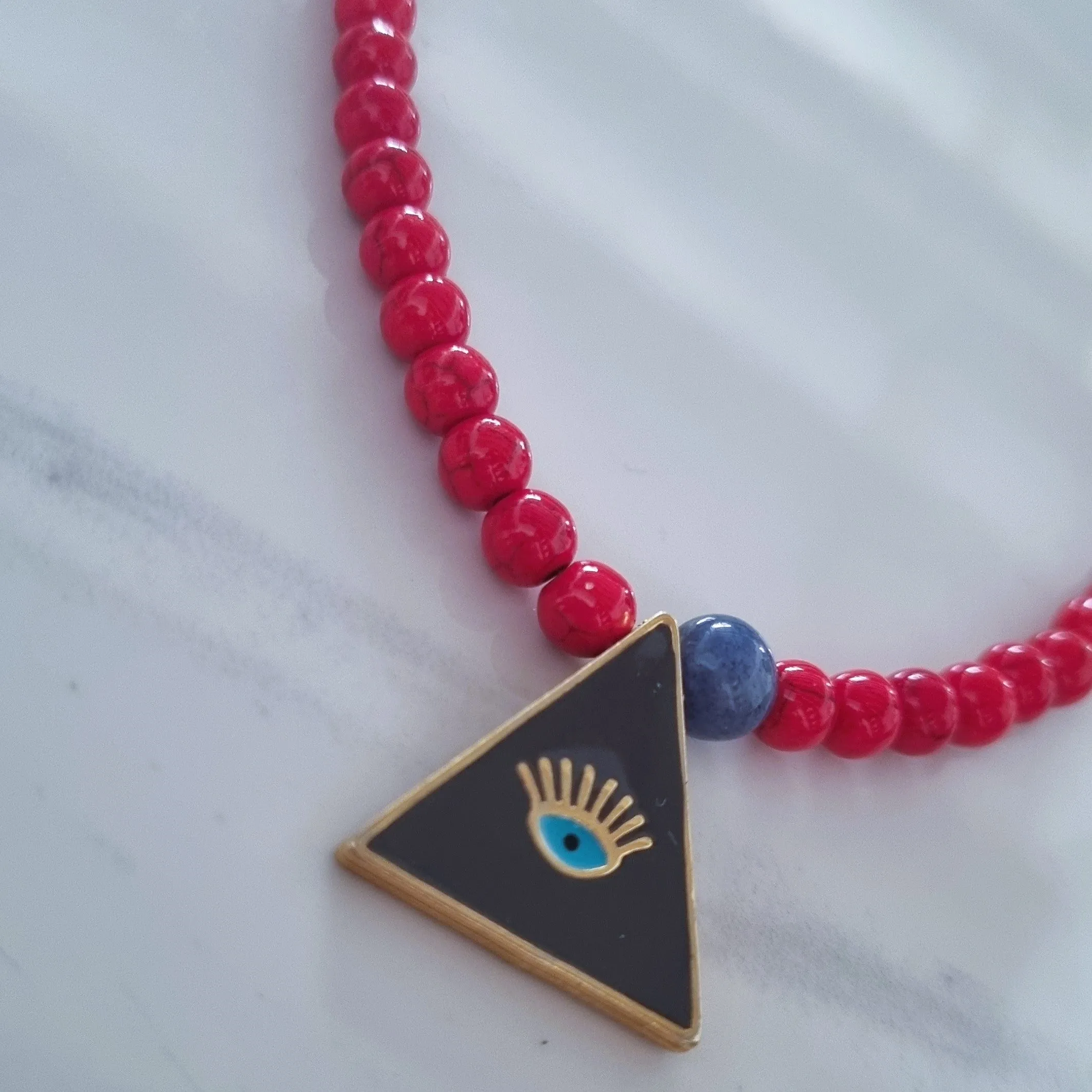 Evil eye/red howlites necklace