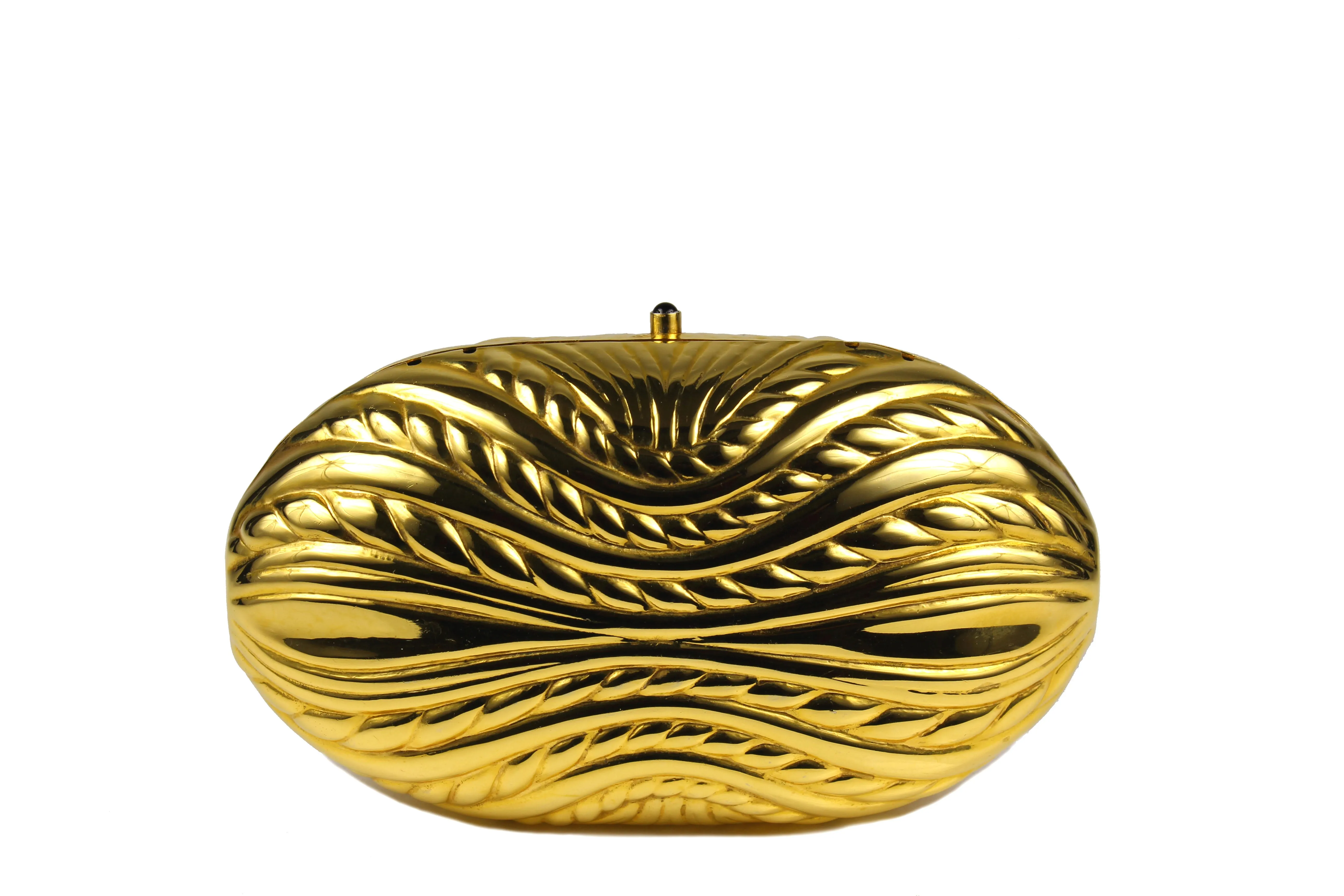 Golden metal oval-shaped clutch