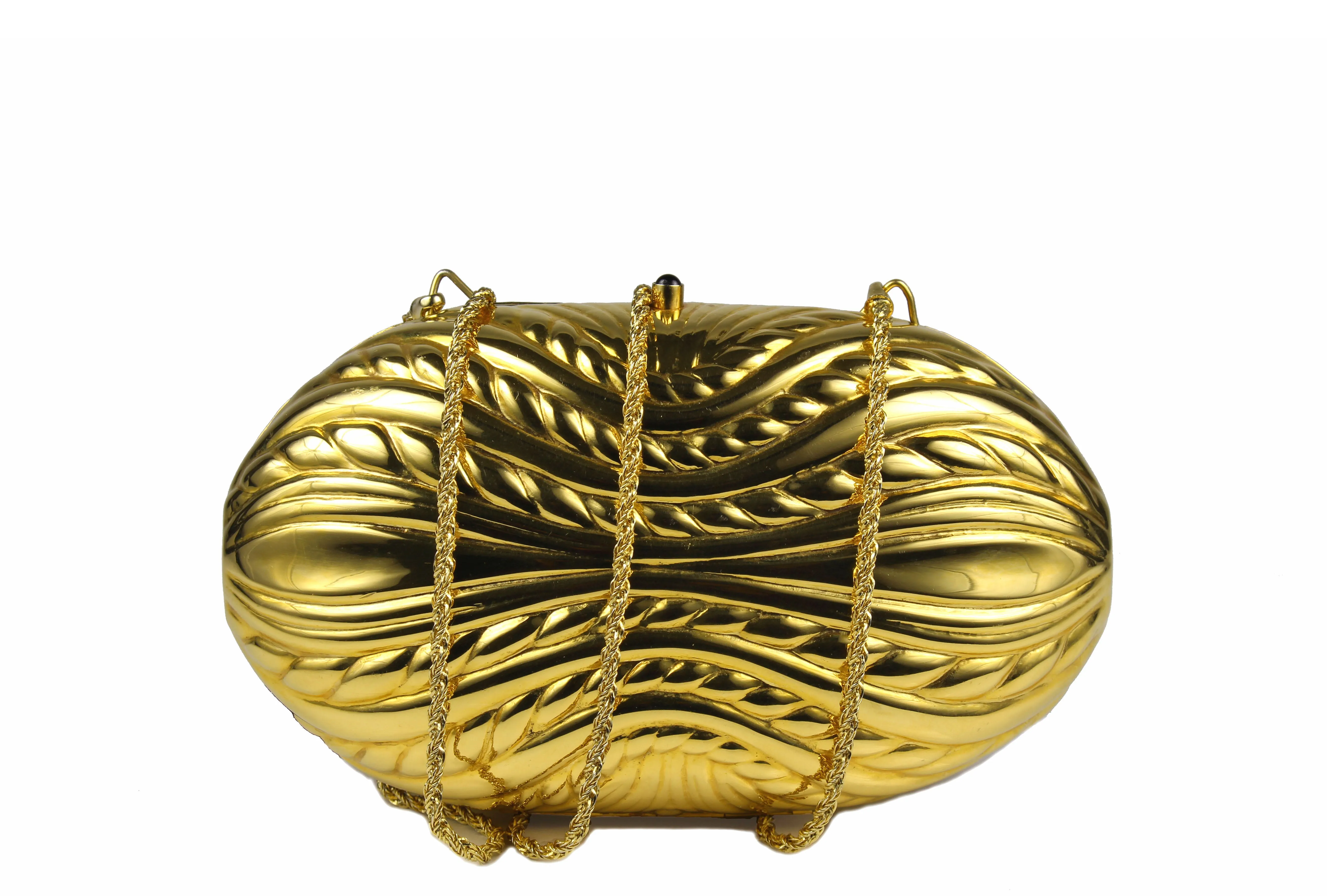 Golden metal oval-shaped clutch