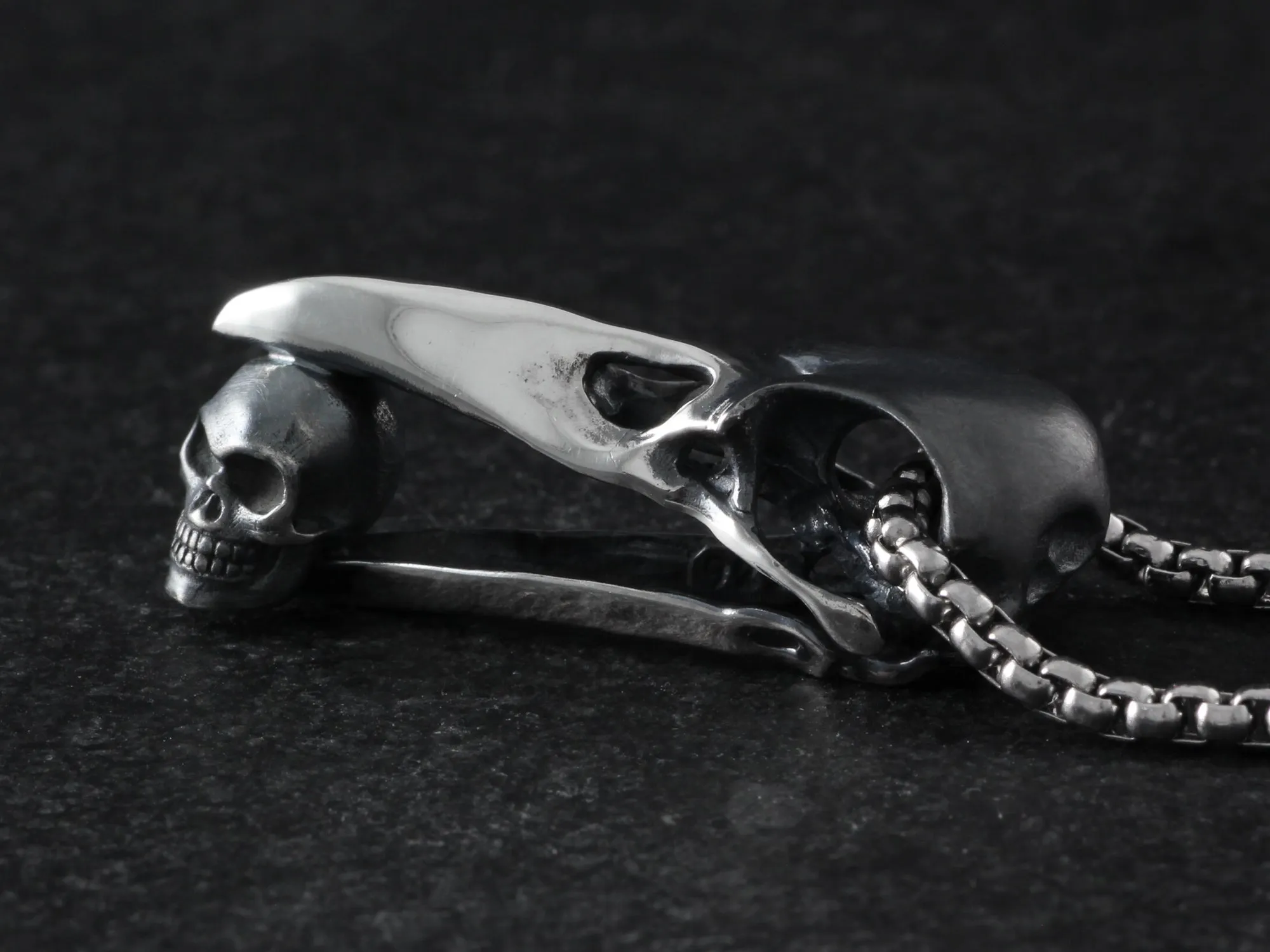 Sterling Silver Raven Skull with Human Skull Necklace